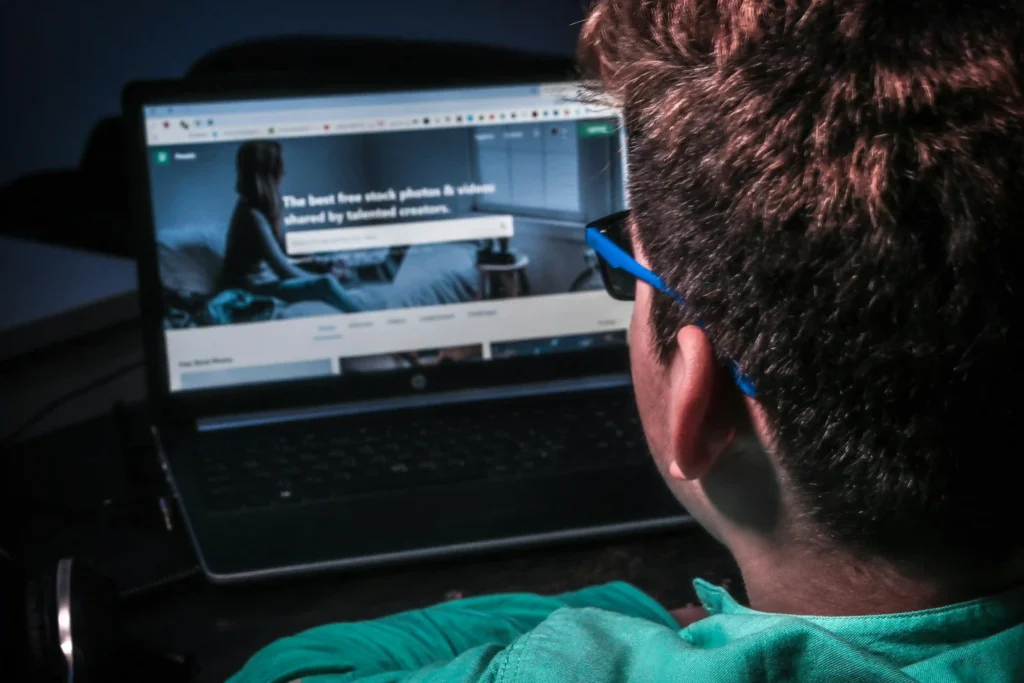 Freelancer comparing Fiverr and Upwork platforms